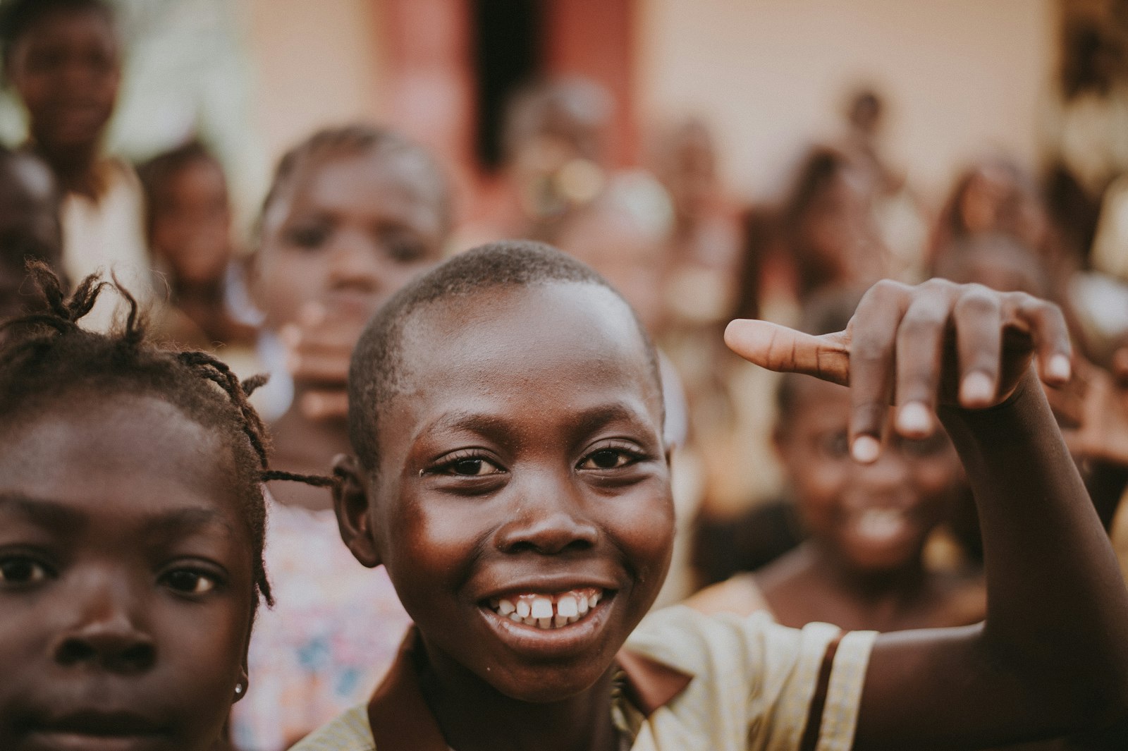 Students laughing together outside their classroom